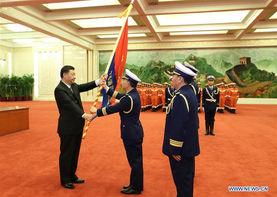 Xi Confers Flag to New National